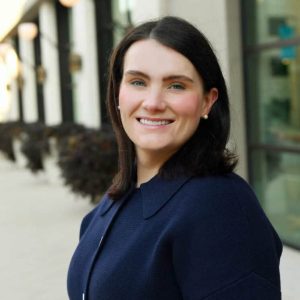 Professional portrait of Erica Franko outside Ventra Health building.