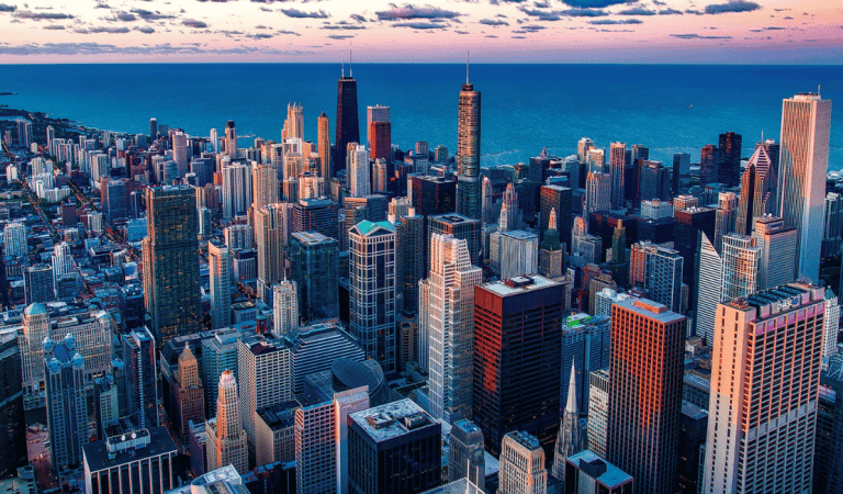 Aerial view of Chicago skyline with Lake Michigan in the background.