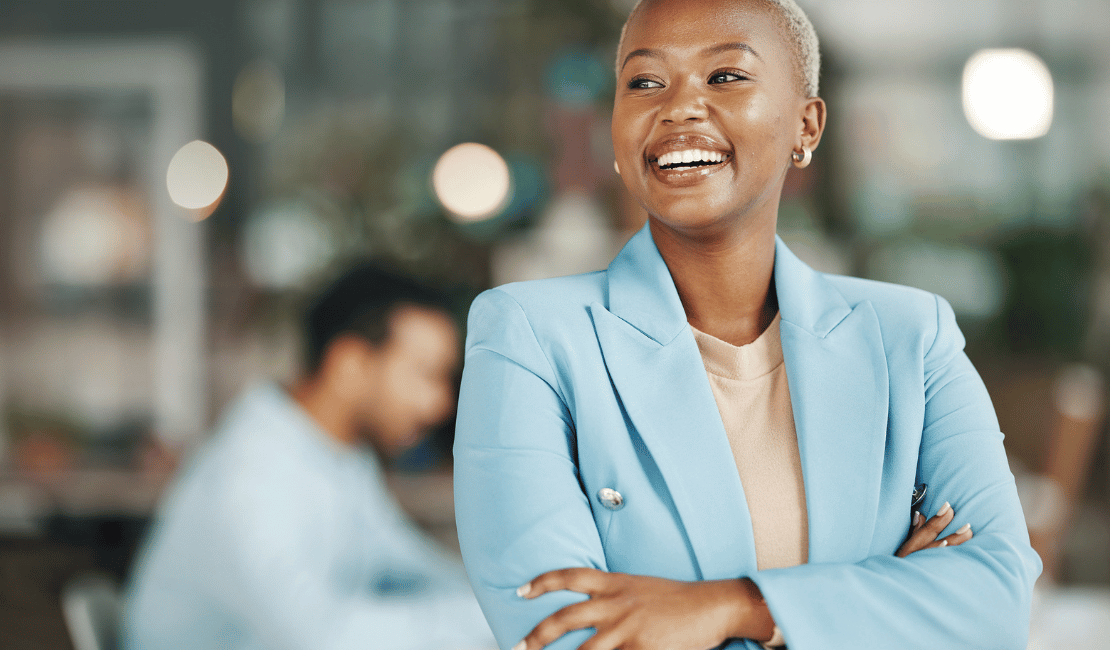 Smiling African American woman in professional attire at Ventra Health.